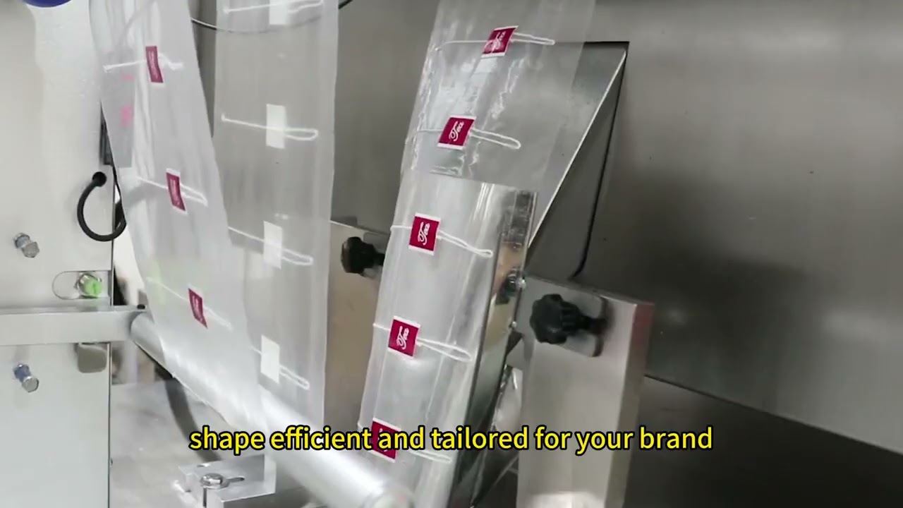 Triangle tea bag inner and outer bag packaging machine