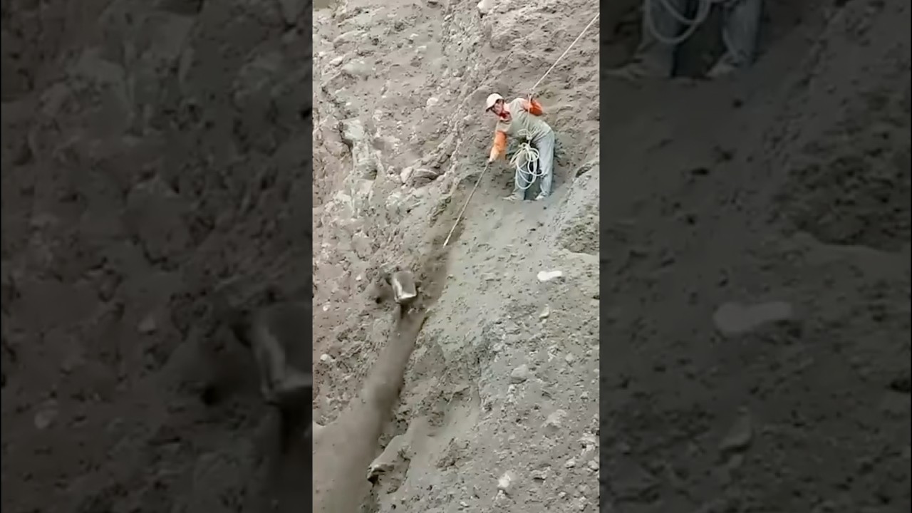 miners use ropes as safety when mining cliffs 