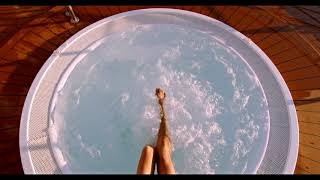 Girl kicking cute feet in a hot tub spa!  So adorable and check out the toes! Feet worship