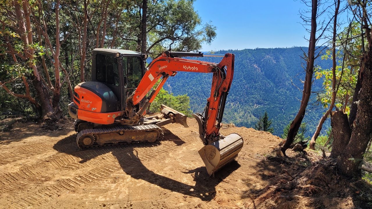 Mountain top pad with a view with the Kubota KX-040 - YouTube