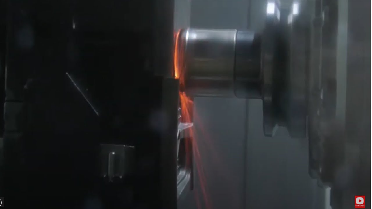 Ceramic NTK cutting tool smashing through hard material