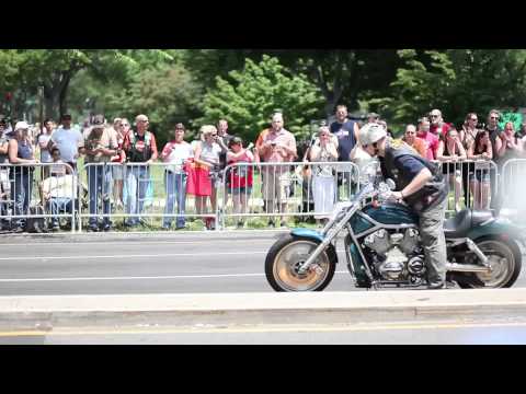 Rolling Thunder rider returns Marine's salute