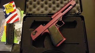 Desert Eagle 50AE. When you need to use half an inch to impress people.