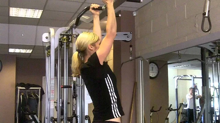Tracey Powell doing 9 pull ups