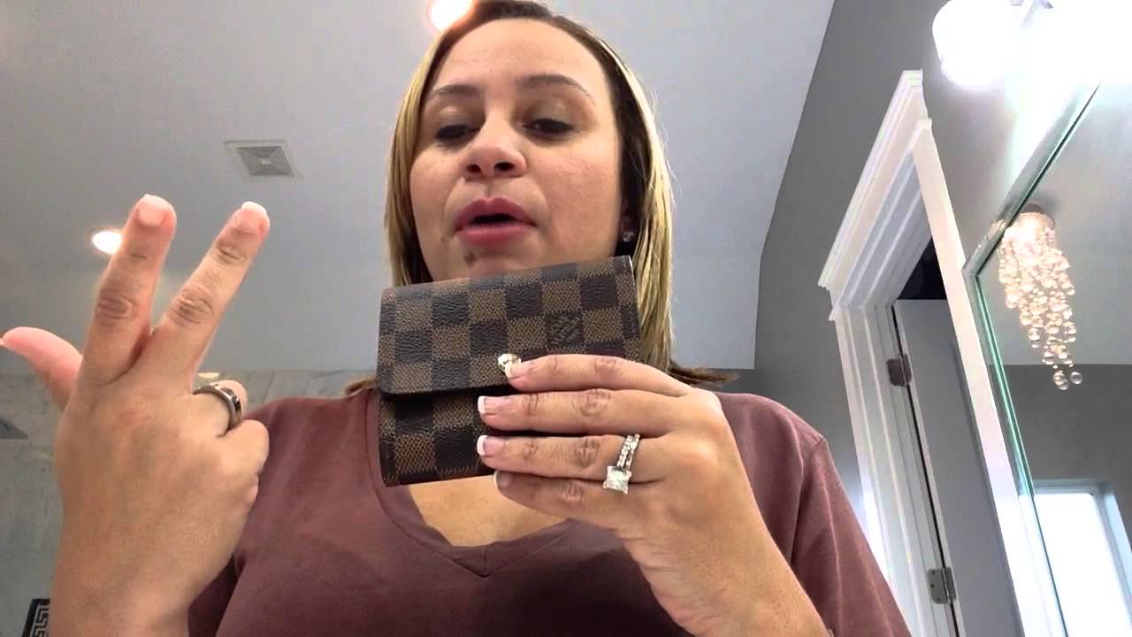 louis vuitton coin holder