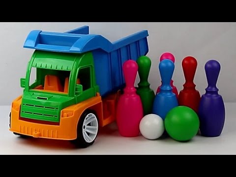 Обзор - распаковка игрушек БАМСИК Грузовик Алекс кегли и шарики