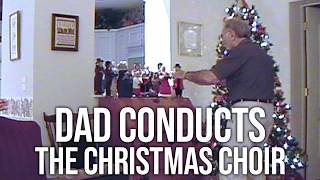 Dad Conducts The Christmas Choir in December 2000