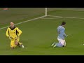 Sergio Aguero scores from a tight angle against Liverpool