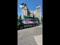 Painted garbage trucks show off messages of sustainability and love for NYC