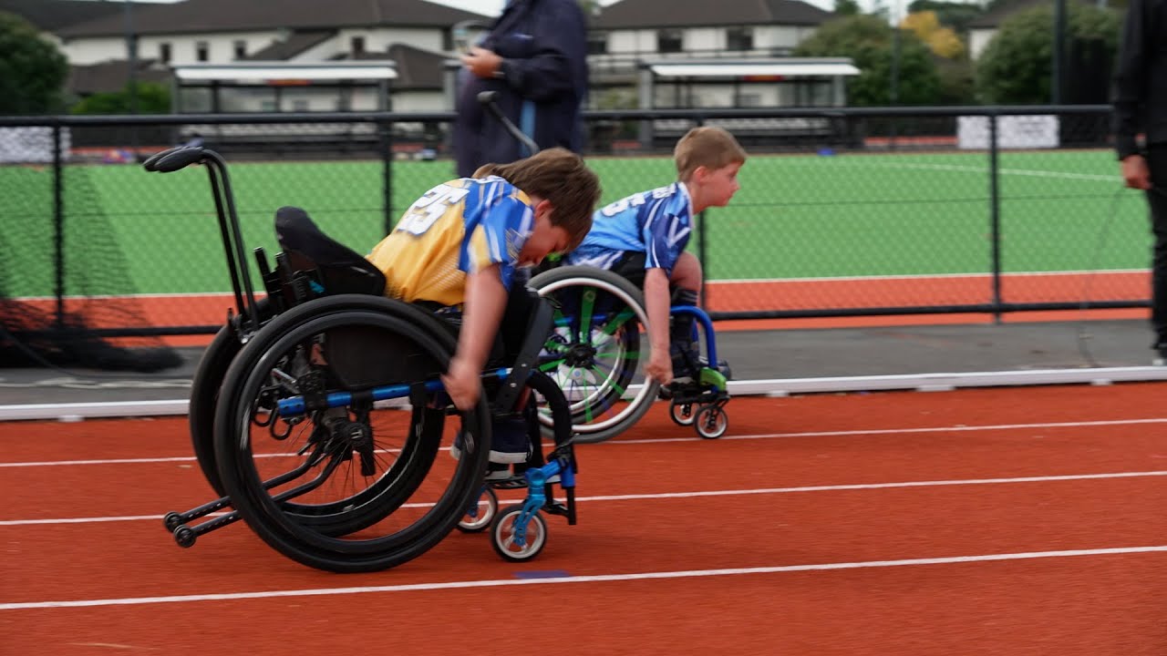 Kid leaves wheelchair for rock wall - YouTube