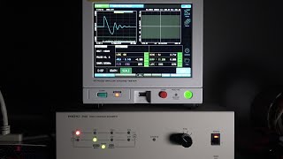 Automatic impulse testing of motor stators using high-voltage relays