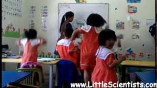 Here is a class of 5 year-olds learning about the the life cycle of a butterfly. The teacher is helping the children learn it by using hand 