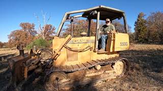 Clearing Trees for Pasture on our Property with a Case 550G Bulldozer.