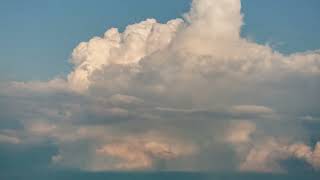 Fluffy summer clouds in time lapse.