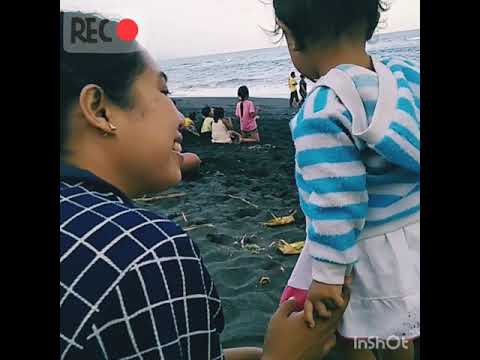 Playing sand with my familly. Saba beach in Bali. Beautiful beach. (Bermain di pantai)