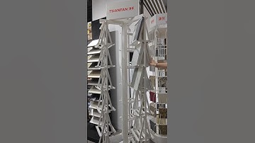 Triangular rotating stone floor stand #displaystand #showroom #stone  #tiles #displayrack #quartz