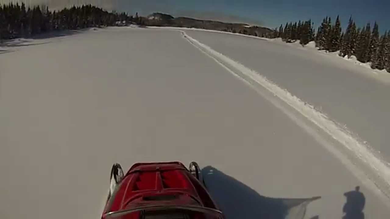polaris indy wide track speed run in deep powder on lake