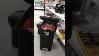 Hiding in trash can