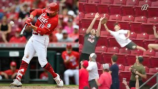 Young Reds fan makes diving catch on a Joey Votto home run