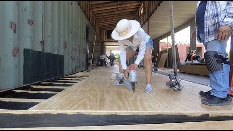 Ep. 13- Subflooring to Join Our Shipping Containers, Gable Roof, Plus a DIY Headgate!