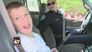 Chance Collins Leads Eaton Rapids Parade with Police