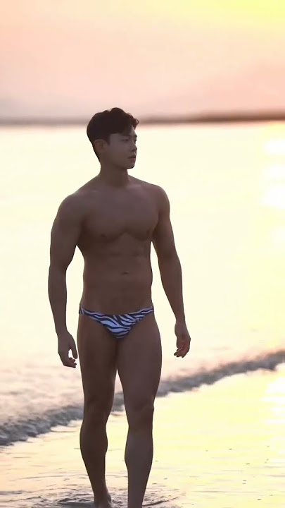 Exotic photoshoot of semi nude gay male ob beach #viral