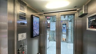 2002 ThyssenKrupp (m. OTIS) traction elevators at OC Flora - Prague, CZ.