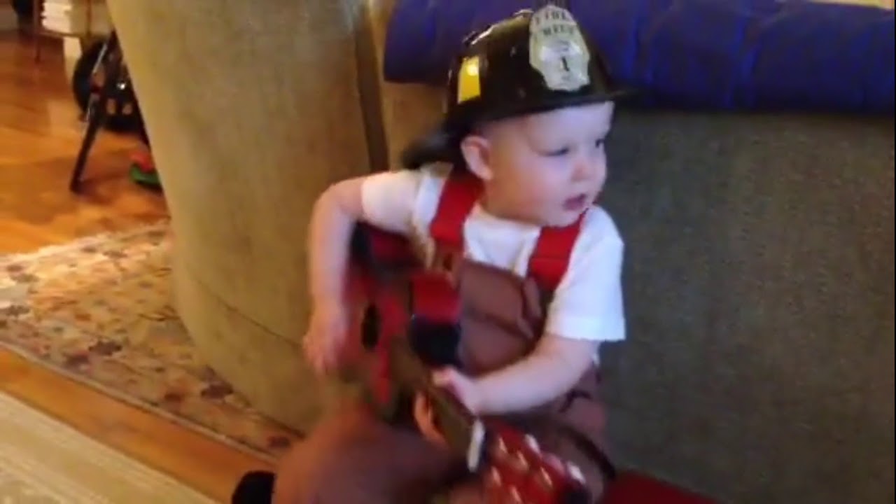 rumble video upload Guitar playing toddler fireman attempts serenade of would be girlfriend dressed as a chicken