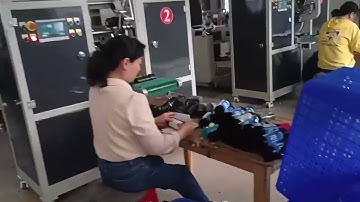Drawstring garbage bag on roll machine with auto sticker  working video from customer factory