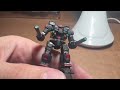 Painting my first BattleTech miniature, a Black Widow Company Warhammer.