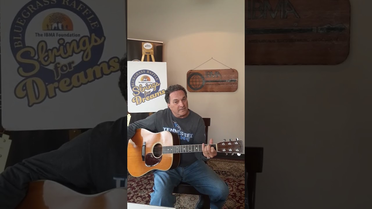 Larry Stephenson with the Strings for Dreams Bluegrass Raffle prize Martin guitar