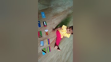toddler identifying flags of countries