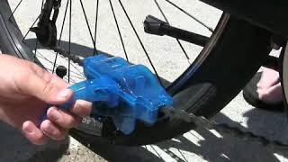 A Handheld Bicycle Chain Pass-Through Scrubber - Core77