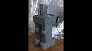 Ratchet foot walking robot base using 3d printed self-reversing screw drive mechanism.