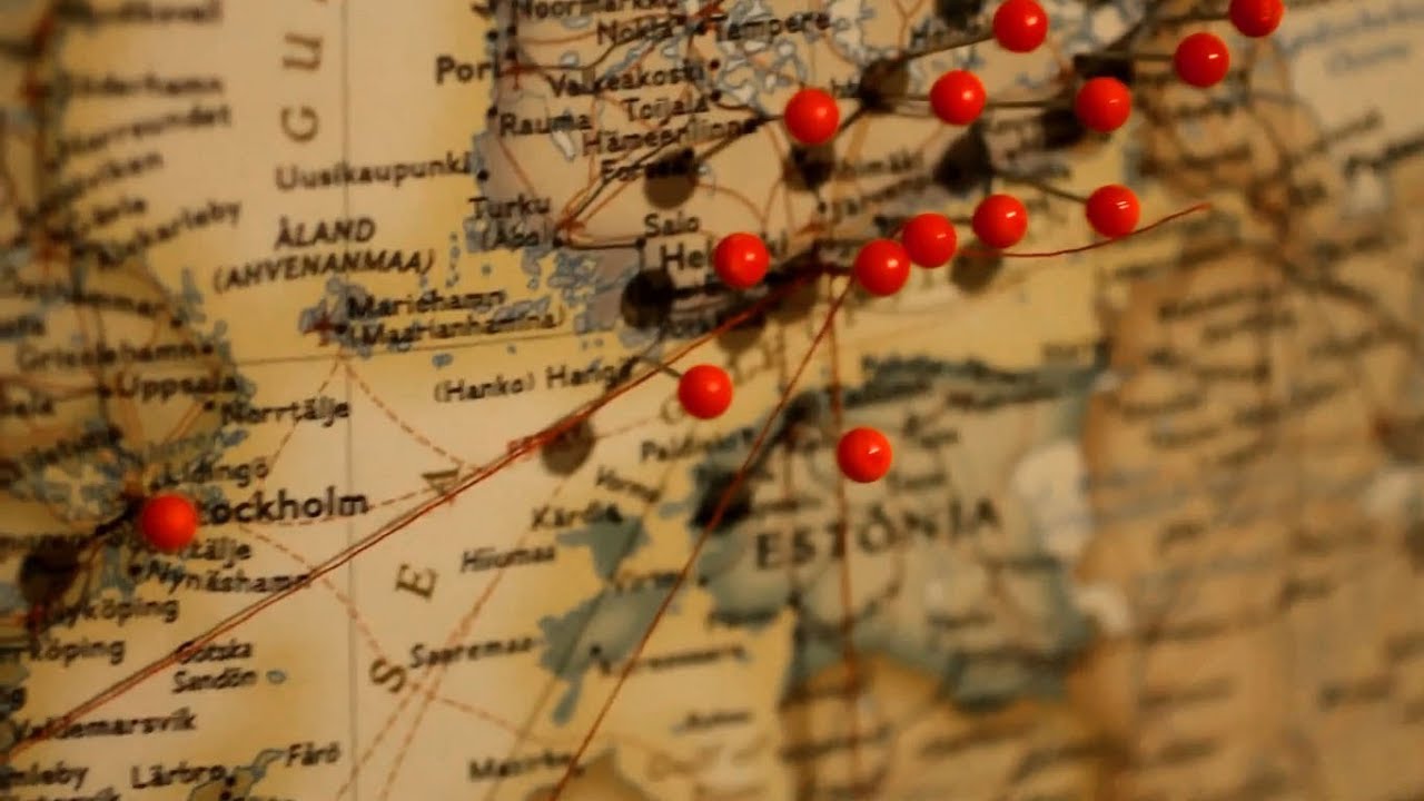 wall map with red pins