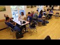 Middle schoolers from Japan sing John Denver with Sebastopol seniors during origami workshop