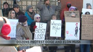 Dozens of people protest the DOGE and Elon Musk in Jackson County