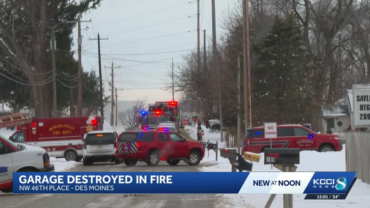 Firefighters battle fire that destroyed garage in Des Moines - YouTube