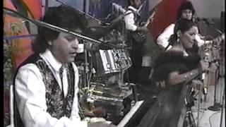 Video thumbnail of "GRUPO AMIGO-ARRIBA EL TELON.1990"