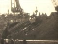 British Railways, steam cranes raising a class 8f locomotive after a shunting accident, 1960's