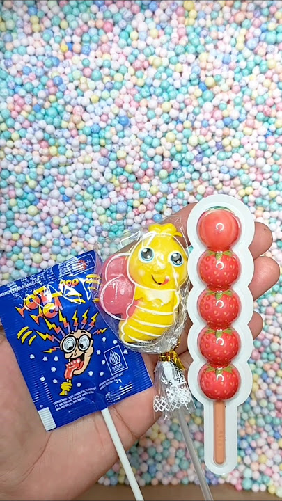 hunting lolipop 🍭🍓 candy 🍬 in styrofoam granules #reversevideos_ #candy #shortvideo #fypシ゚viral