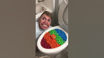 Thumbnail of Eating Colorful Chocolate M&M's Candy in Toilet #shorts