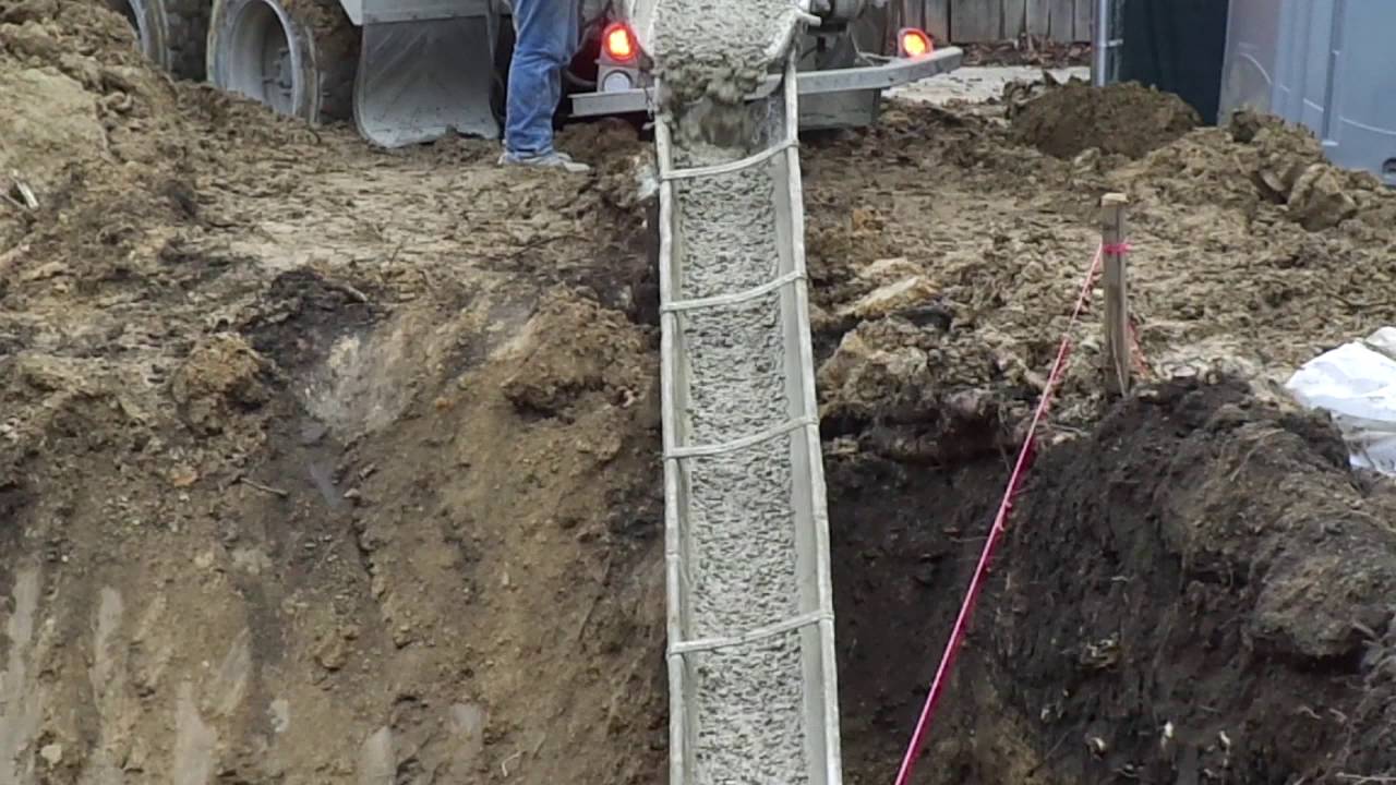 Pouring the Concrete Footings - Chicago Home Addition Construction