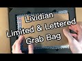 Unboxing the lividian numbered and lettered edition grab bag  fanciest sampler pack of books ever