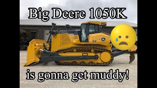 John Deere 1050K dozer pushing dirt and ripping rock along with 850J