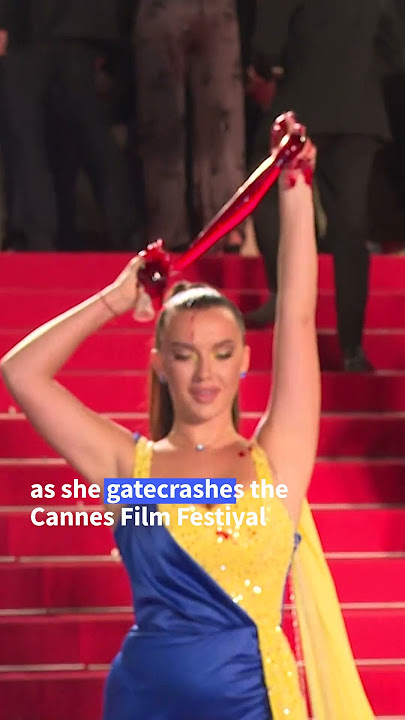 Protester pours fake blood on herself at Cannes Film Festival | AFP #shorts