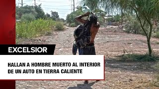 Hallan a hombre muerto al interior de un auto en Tierra Caliente