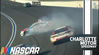 Kyle Busch spins out while racing Daniel Suárez for the lead at Charlotte