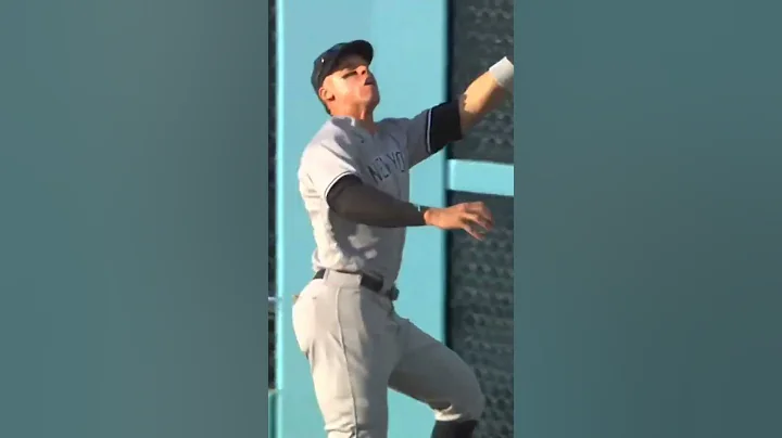 AARON JUDGE BROKE DODGER STADIUM ... LITERALLY! He runs through a wall to make AMAZING GRAB!!