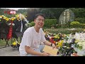 袁隆平逝世五周年 墓前摆满青年留言